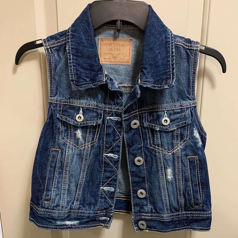 Distressed denim vest
